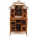 A large late Victorian bamboo sideboard, fitted with 29 original lacquer panels, mirrored shelved