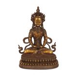 A Sino Tibetan large seated brass Buddha, inset with coloured semi-precious stones, 45cm high
