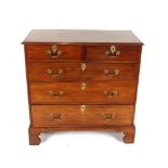 A 19th Century mahogany chest of two short and three log drawers, raised on bracket feet, 95cm wide