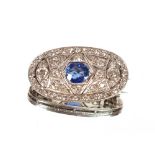 An Art Deco white metal diamond and sapphire set brooch, approx. 9gms total weight