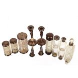 Various glass and silver mounted scent bottles, tidy jars, silver mounted nail buffer, and various