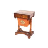 A 19th Century rosewood work table, fitted single drawer and pull out silk bag below, raised on