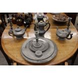 Two pewter chargers; a pewter tappit hen; three pewter teapots etc.