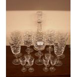 A part suite of table glassware, comprising six claret glasses, six hock glasses, six liqueurs,