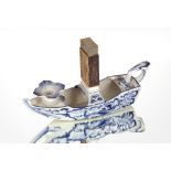 An unusual Delftware barge shaped chamberstick / matchbox holder, 22cm long