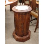 A Victorian mahogany pot cupboard, of circular fluted form with white marble insert to the top,