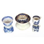 A late 18th Century Caughley blue and white cup, a Chinese tea bowl and saucer with scenic pagoda