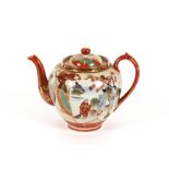 A Japanese teapot, decorated Geisha and scenic views heightened in gilt with integral strainer, 17cm