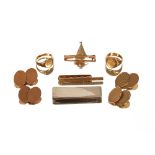 A 9ct gold signet ring, monogrammed; a smaller similar; a 9ct gold tie clip; a 9ct gold bar brooch