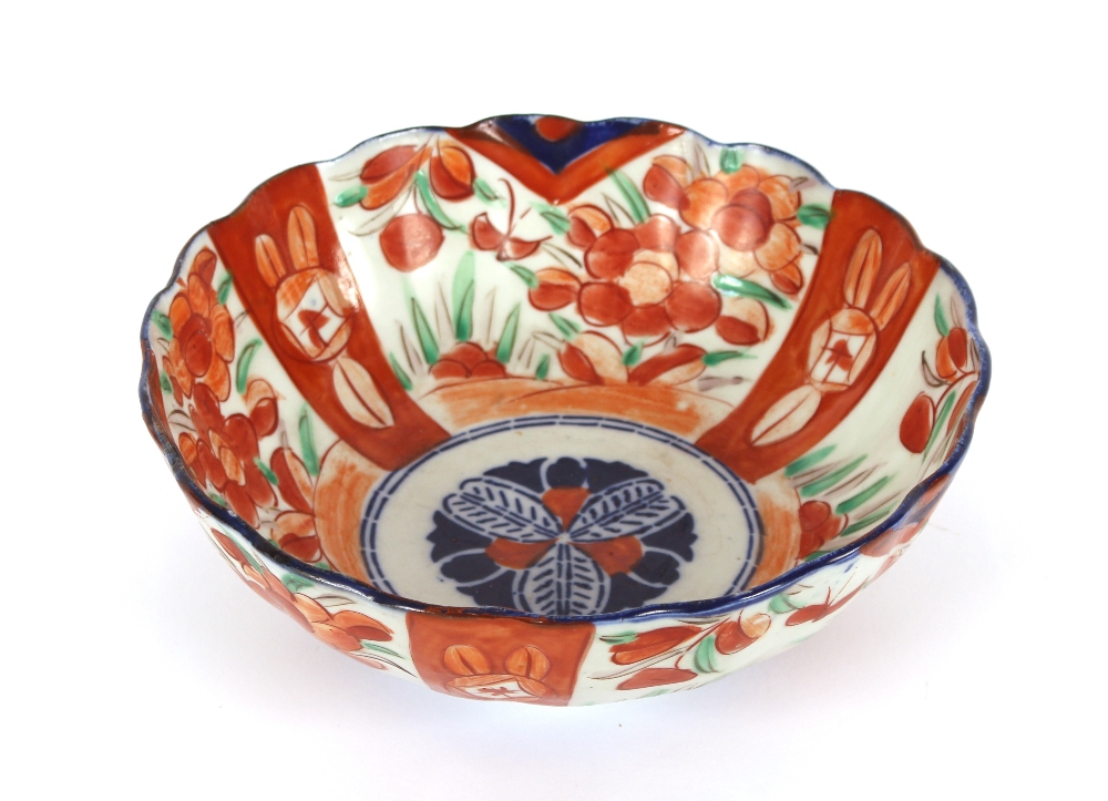 A large Japanese Imari charger, having scallop border decorated in the traditional manner, - Image 2 of 2