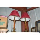 A pair of table lamps and shades