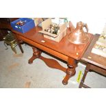 A Victorian mahogany stretcher table fitted single