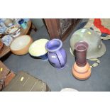Two pottery bowls; a vase; and a purple glazed jug