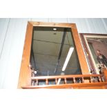 A modern pine framed mirror