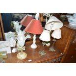 Two pairs of table lamps; and two single table lam