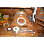 Two walnut cased mantle clocks and a barometer