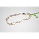 A 9ct gold and mother of pearl set bracelet