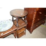 An oak circular topped coffee table; and an oak sq