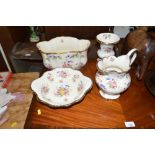 Four items of floral decorated china to include a