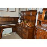 An Ercol dresser fitted four drawers below