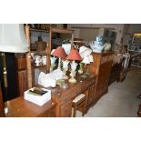An oak linenfold decorated dressing table and carved oak