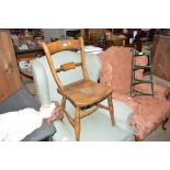 An elm seated bar back kitchen chair