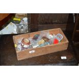 A wooden box of craft items etc.