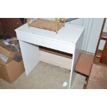 A modern dressing table with lift up top