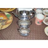 A silver plated half fluted three piece teaset