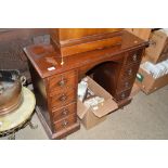 A mahogany twin pedestal desk