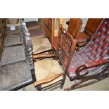 Two oak spindle back rush seated chairs