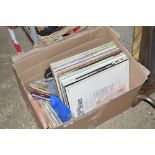 A box of records and CD's