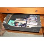 A box containing DVD's/CD's; and a DVD player