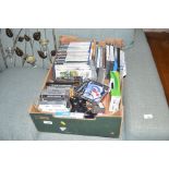 A box of various video games; and accessories to i