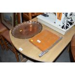 A guillotine; J S & S copper tray