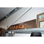 A painted wooden pub sign for Snooks