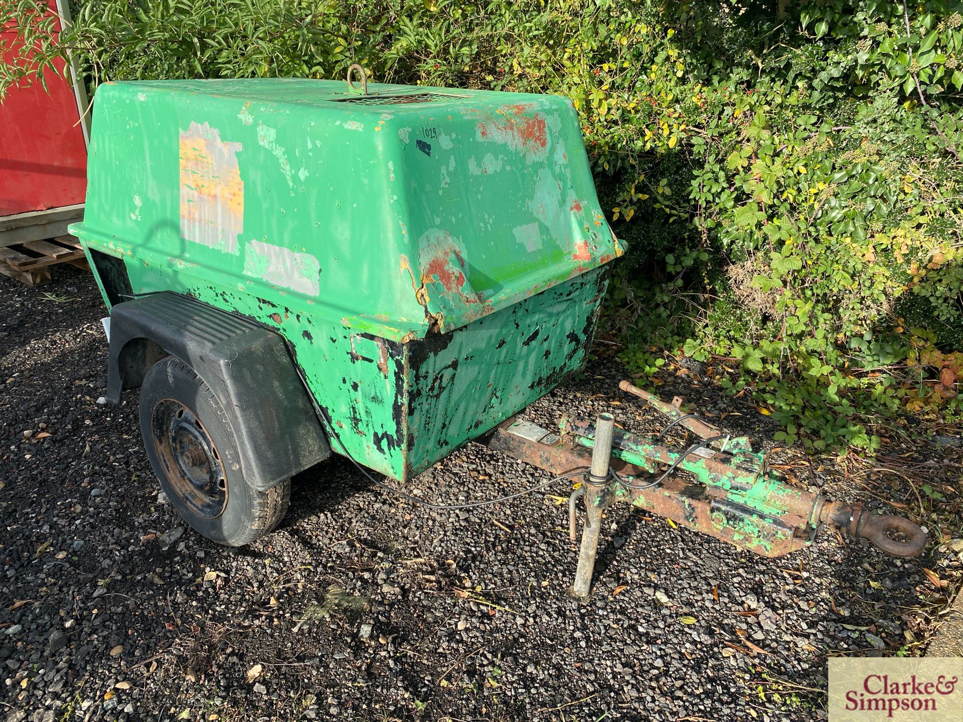 Ingersoll Rand road tow compressor. With air tools and hose.