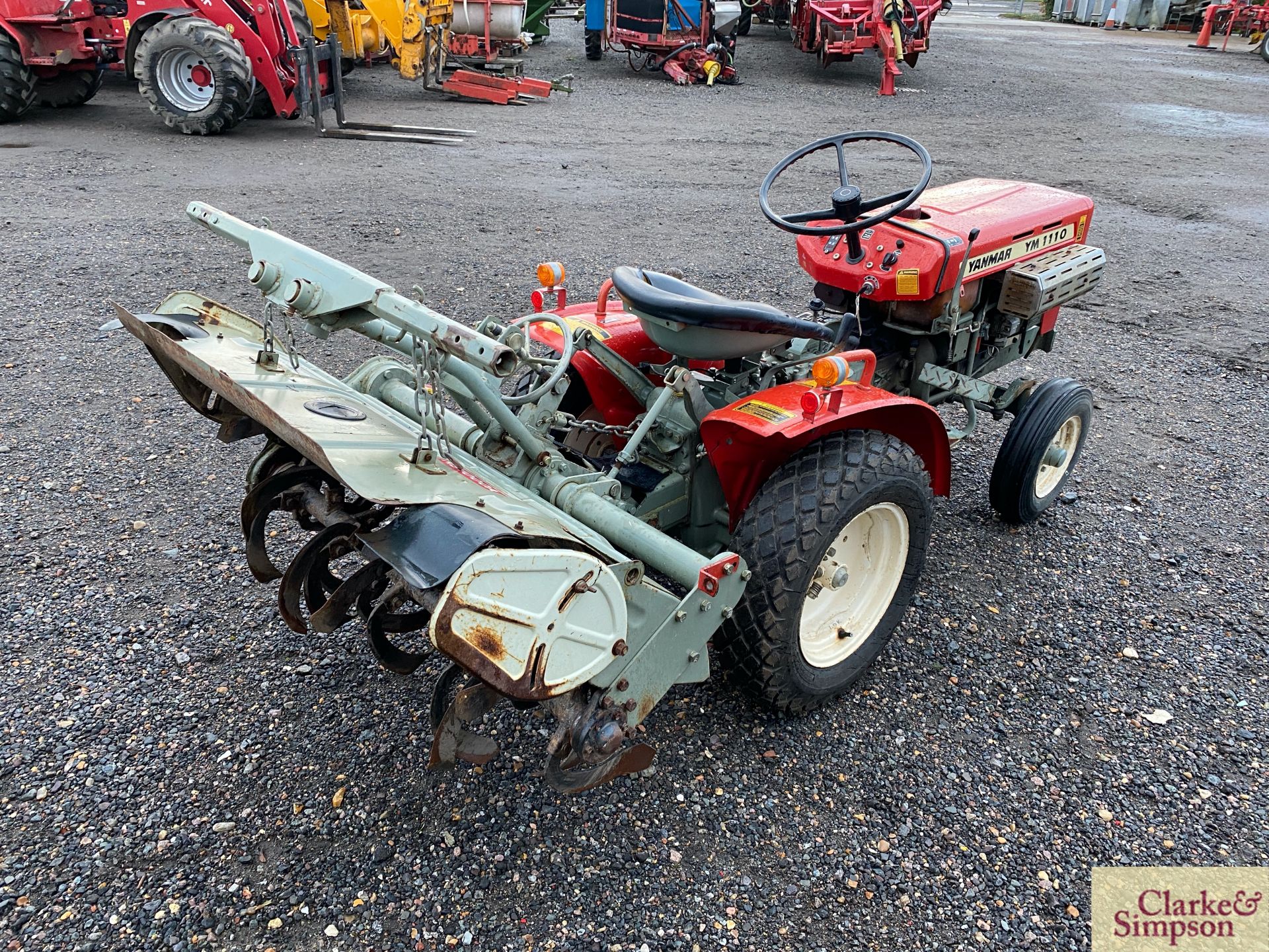 Yanmar 1100 2WD compact tractor. With Yanmar RS1000A mounted rotovator. Recent new turf tyres. - Image 21 of 26