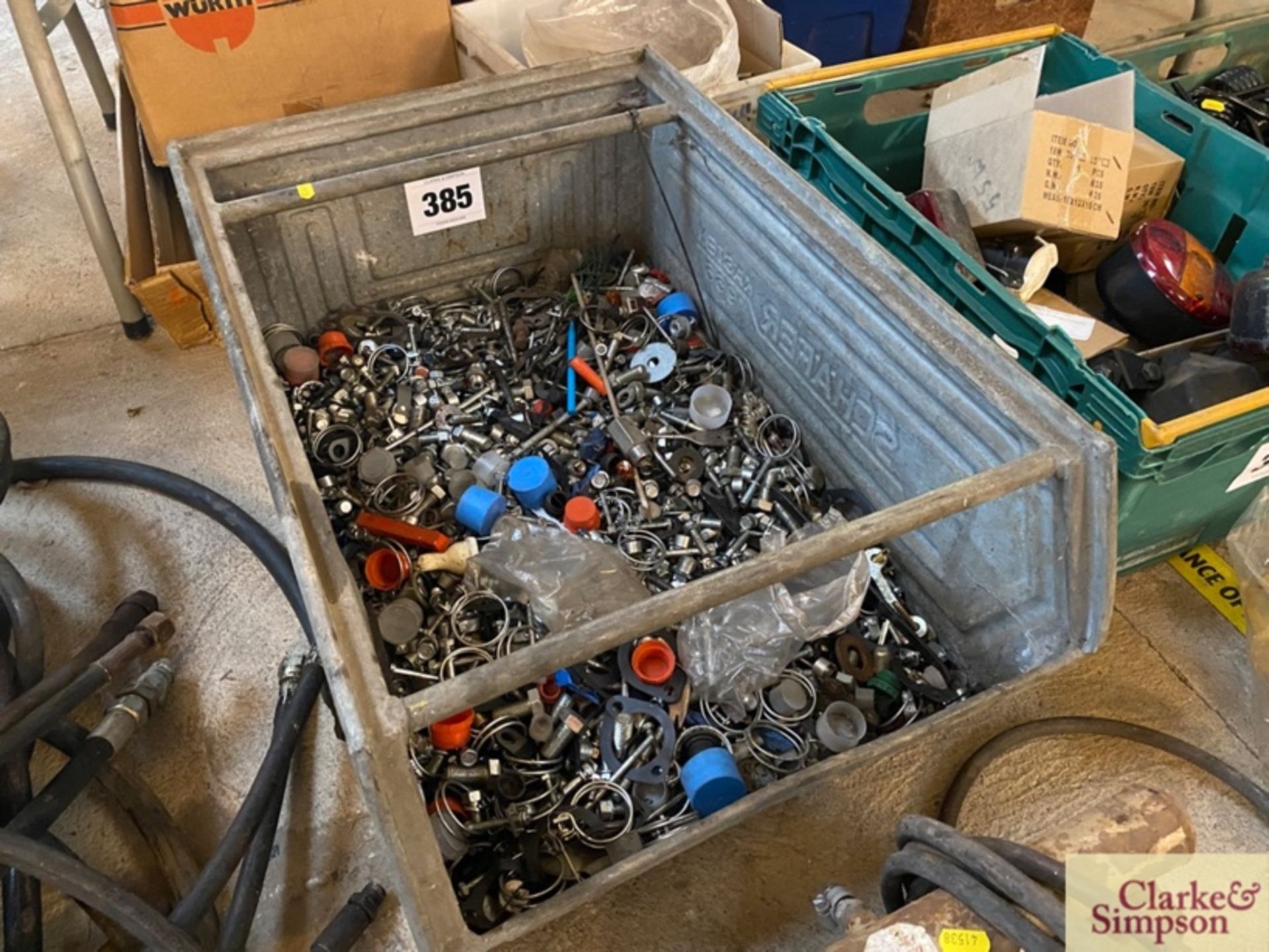 Large quantity of nuts and bolts.