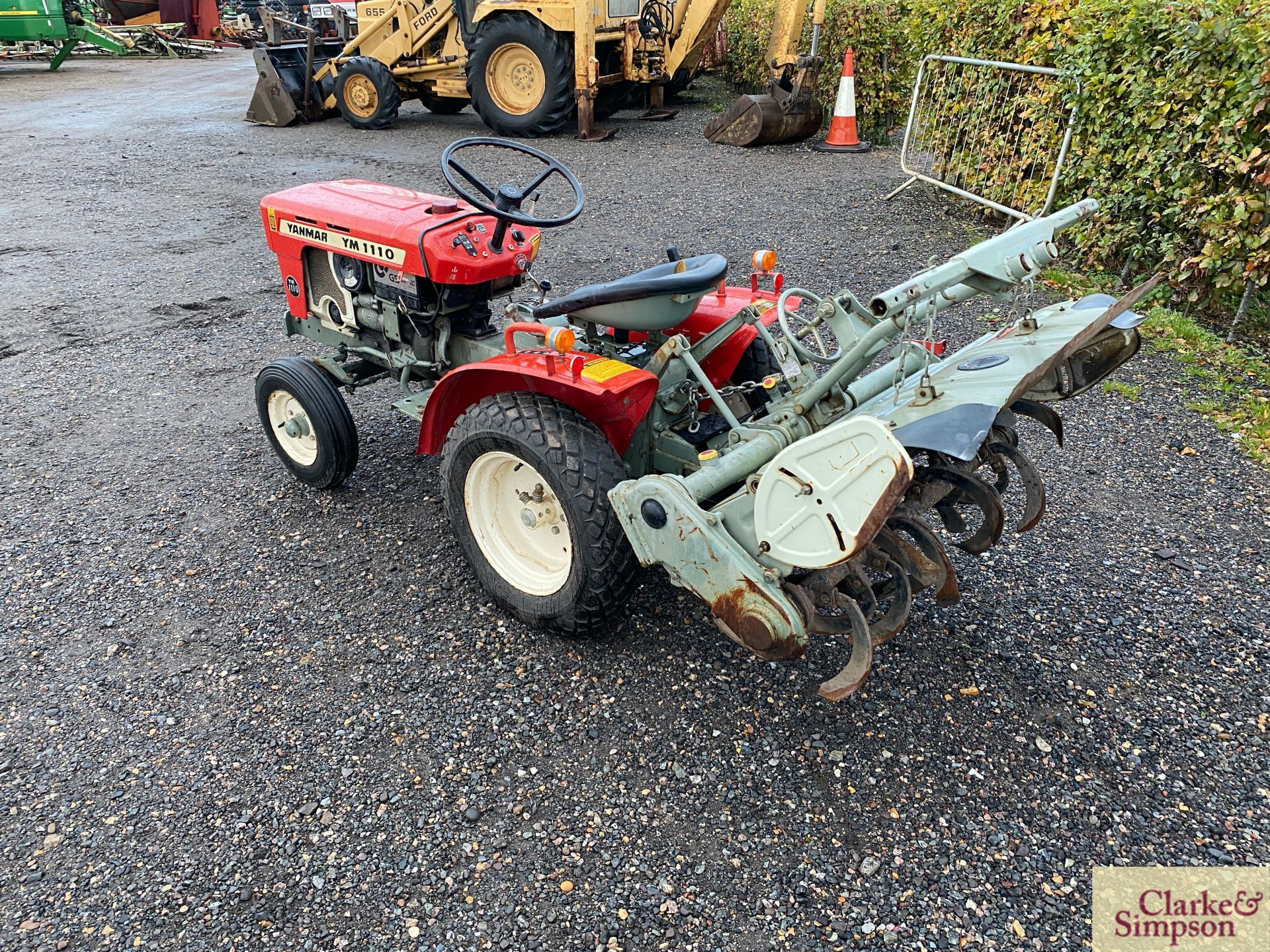 Yanmar 1100 2WD compact tractor. With Yanmar RS1000A mounted rotovator. Recent new turf tyres. - Image 23 of 26