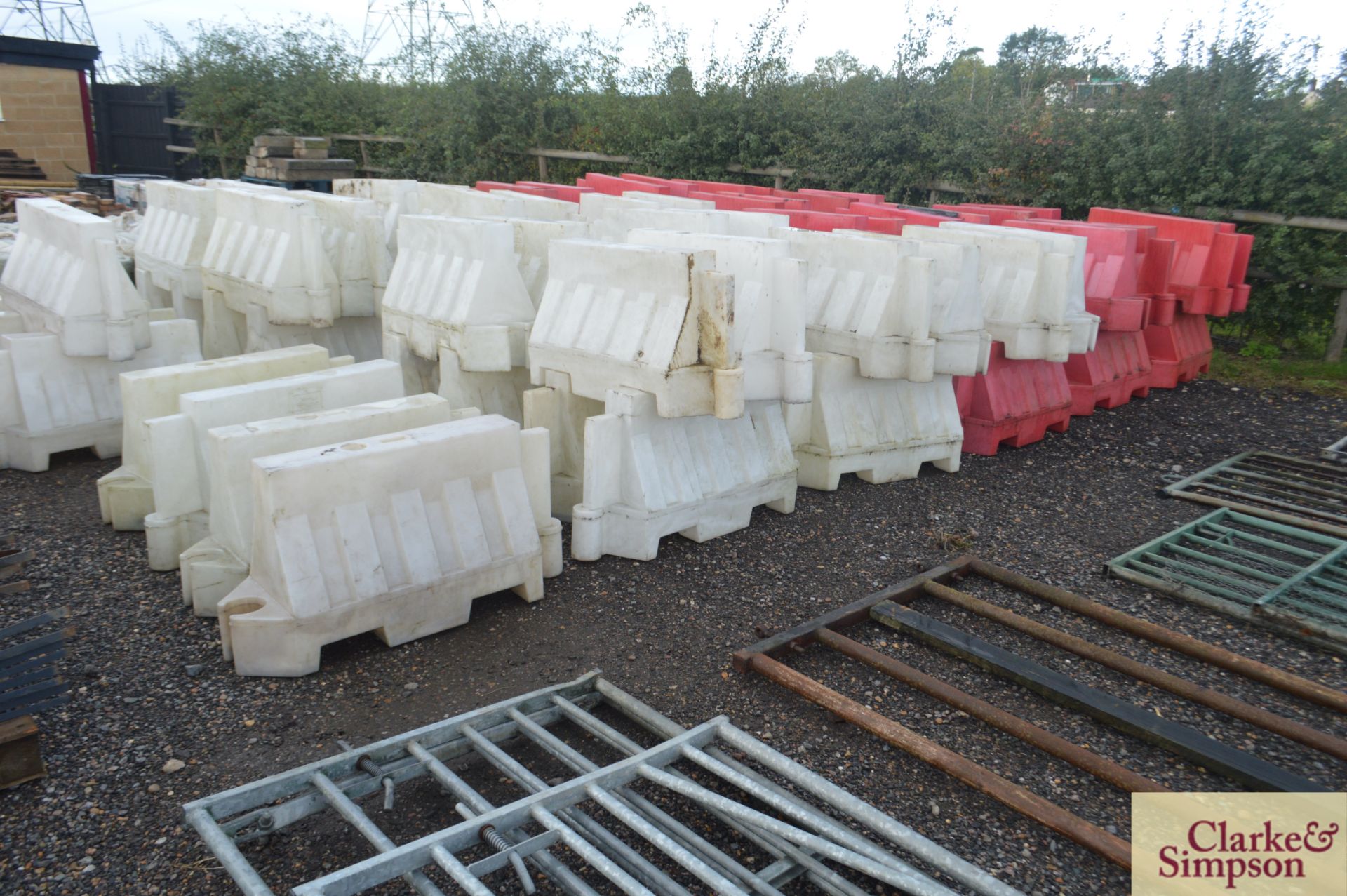 Large quantity of water filled traffic barriers. * - Image 2 of 7