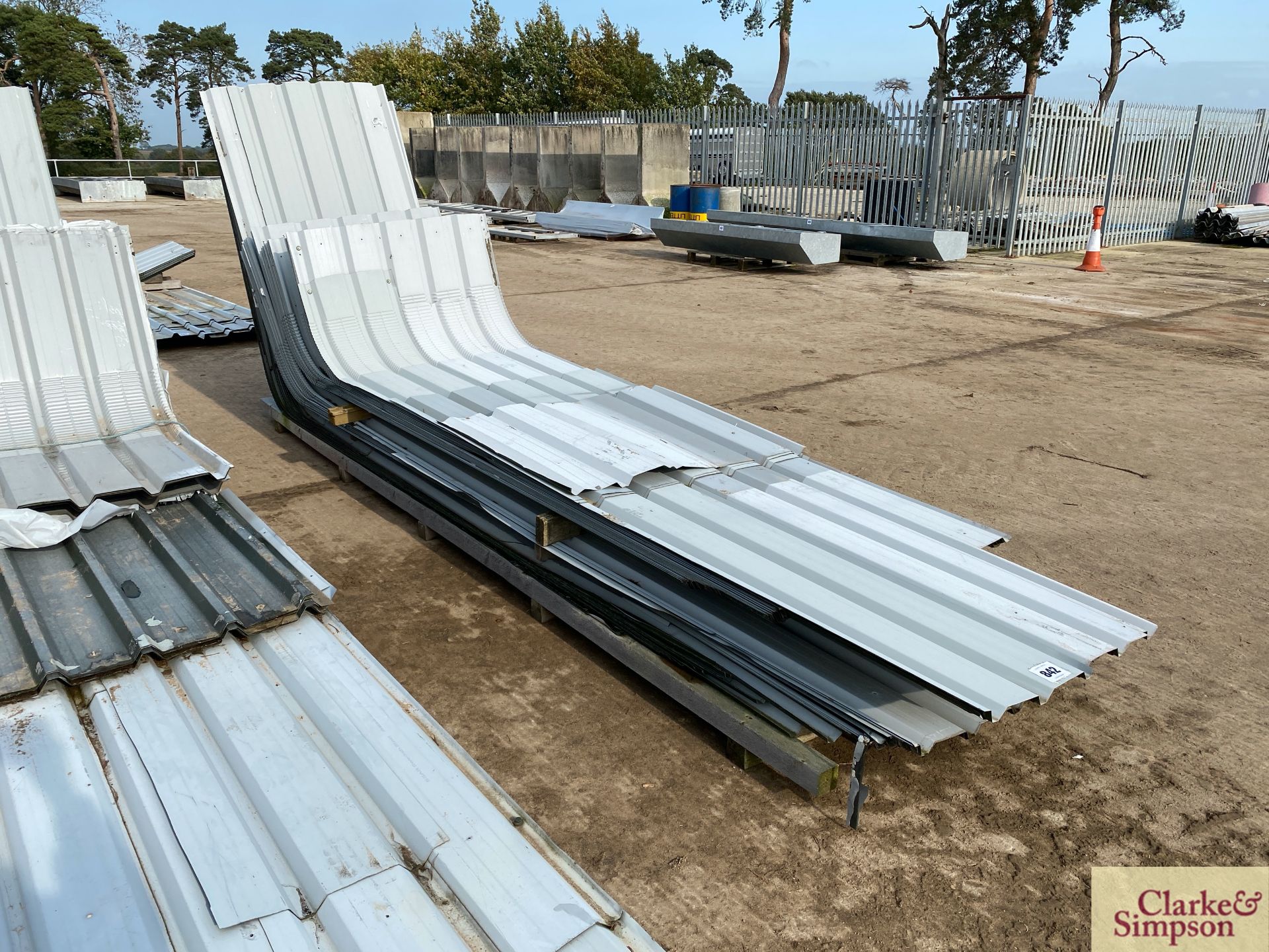 Quantity of new and used box profile curved eaves. * [Located Roudham]