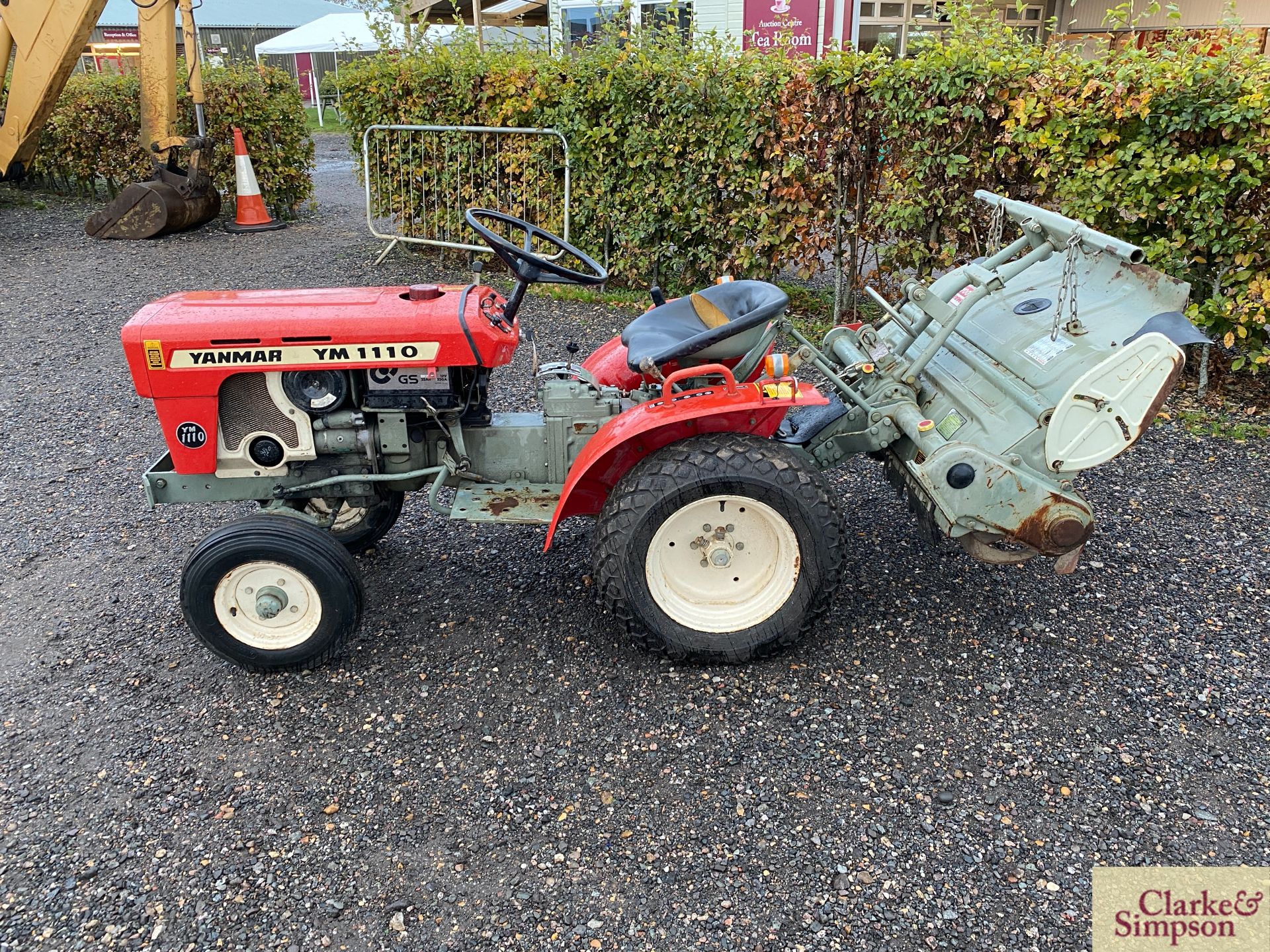Yanmar 1100 2WD compact tractor. With Yanmar RS1000A mounted rotovator. Recent new turf tyres. - Image 24 of 26