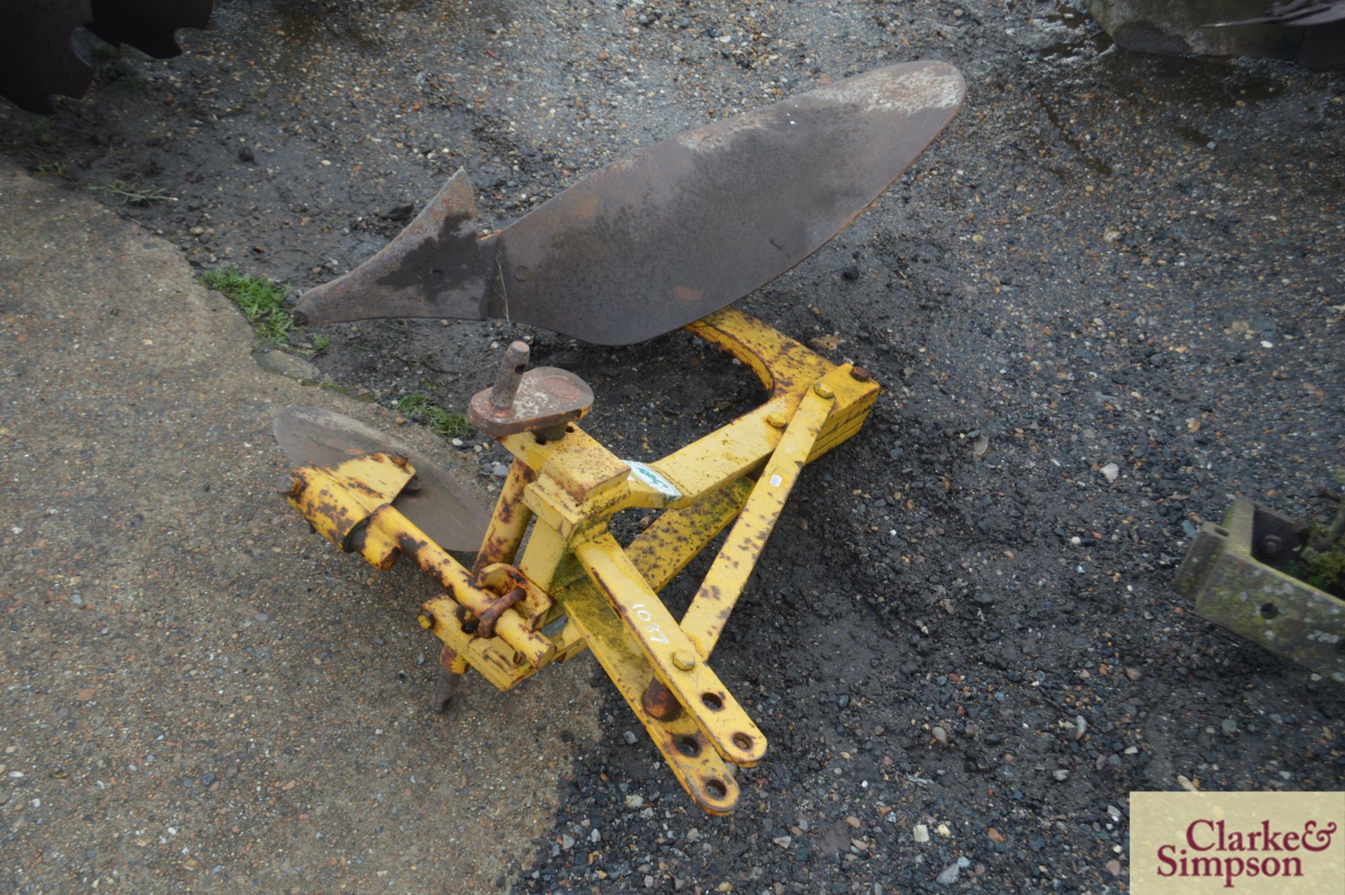 Single furrow plough for compact tractor.