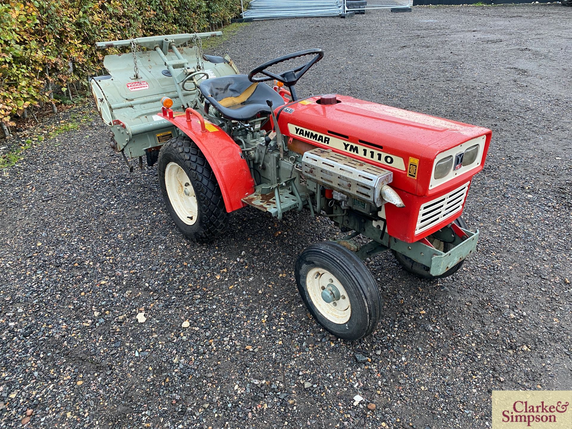 Yanmar 1100 2WD compact tractor. With Yanmar RS1000A mounted rotovator. Recent new turf tyres.