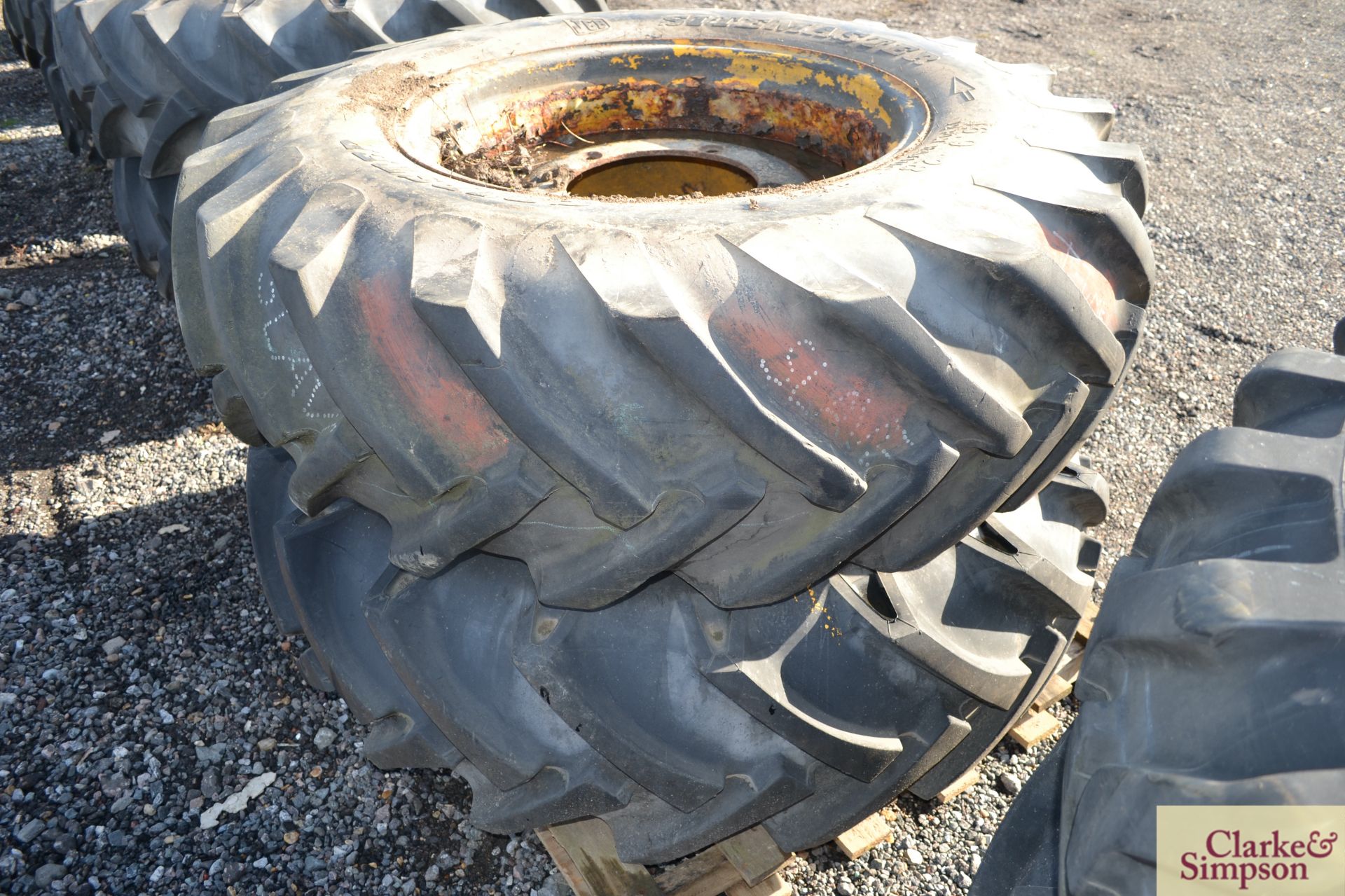 Pair of JCB 3CX 16.9R28 rear wheels and tyres. *