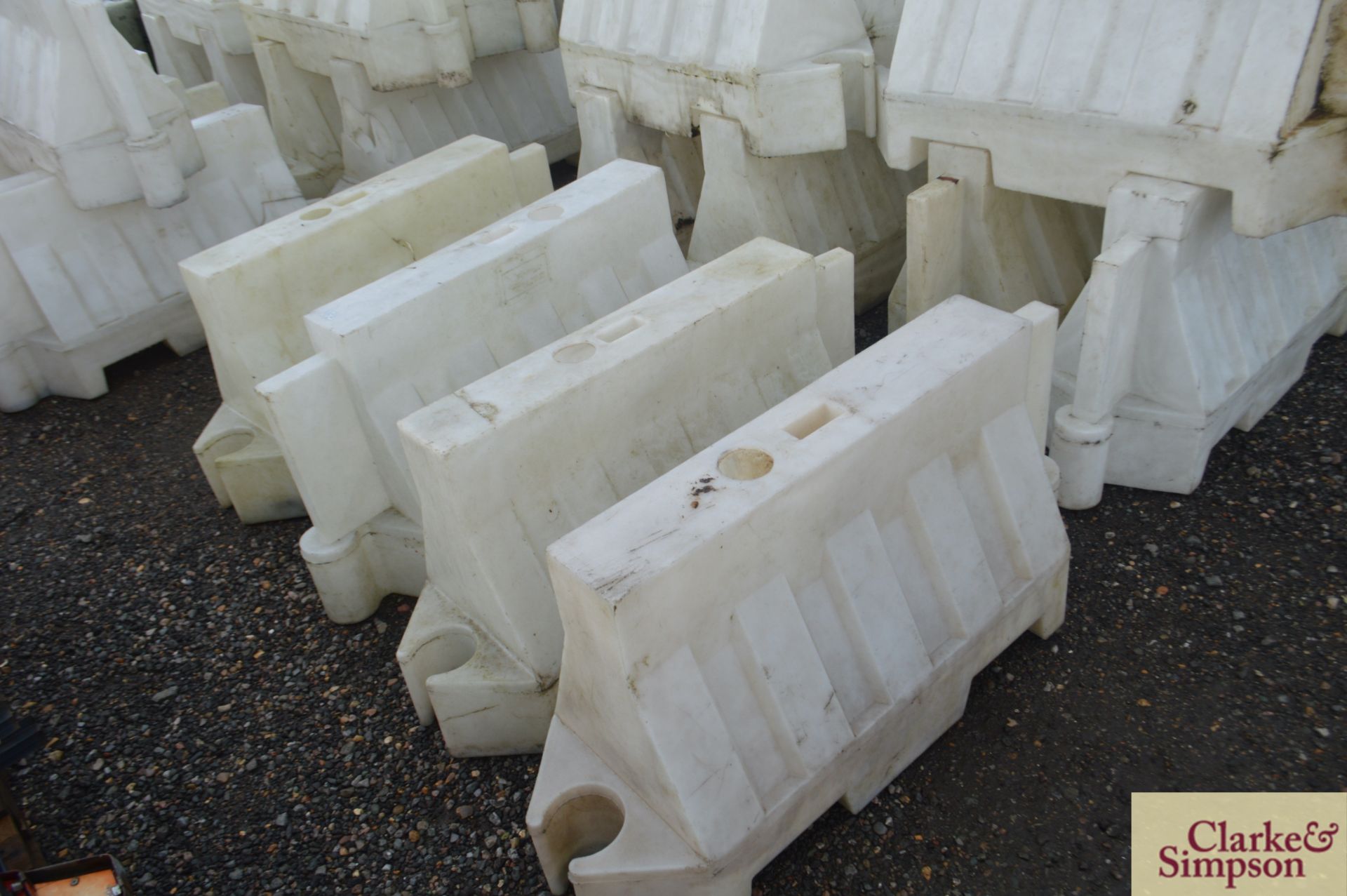 Large quantity of water filled traffic barriers. * - Image 3 of 7