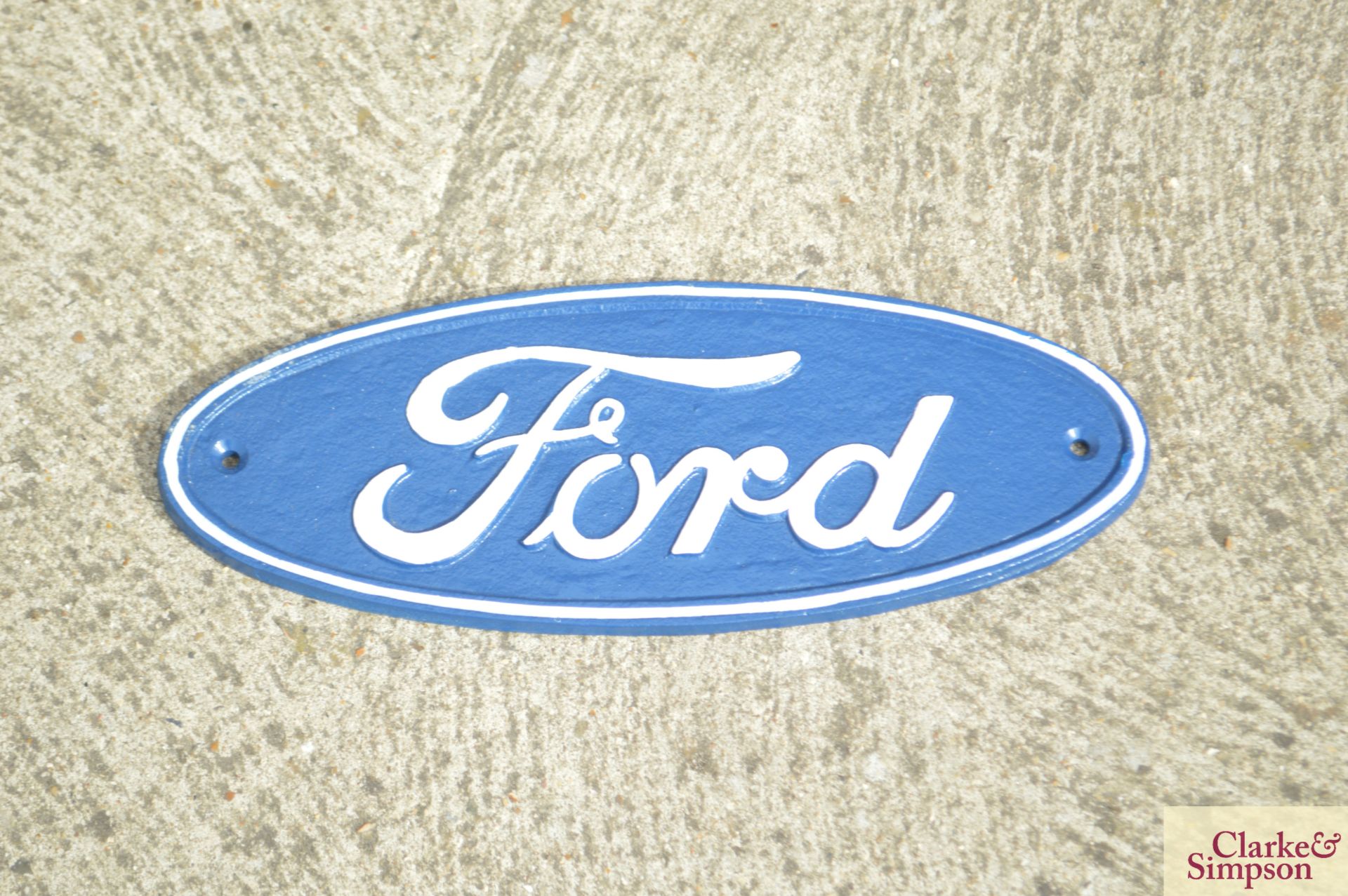 Oval Ford sign.*