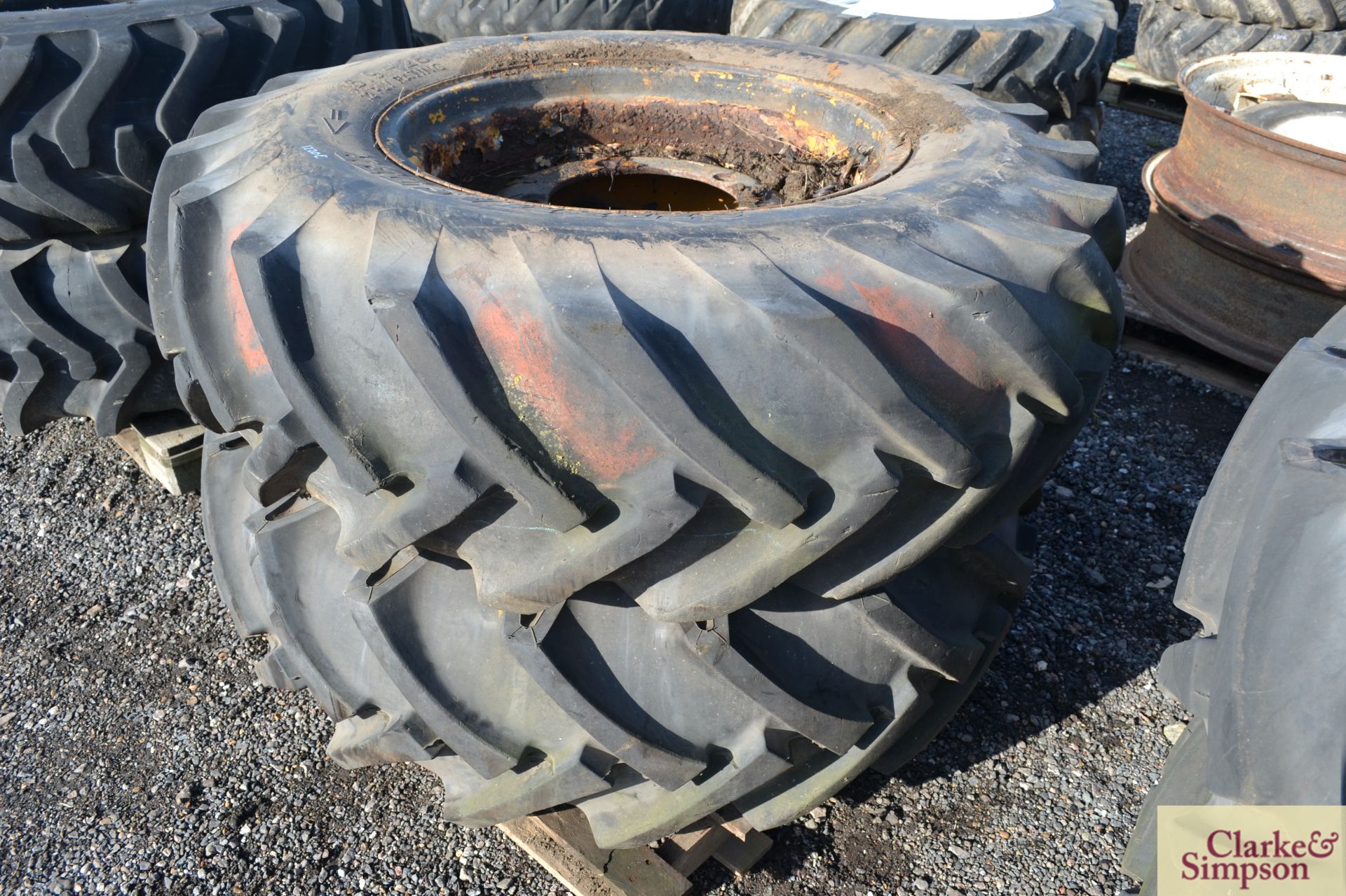 Pair of JCB 3CX 16.9R28 rear wheels and tyres. * - Image 2 of 3