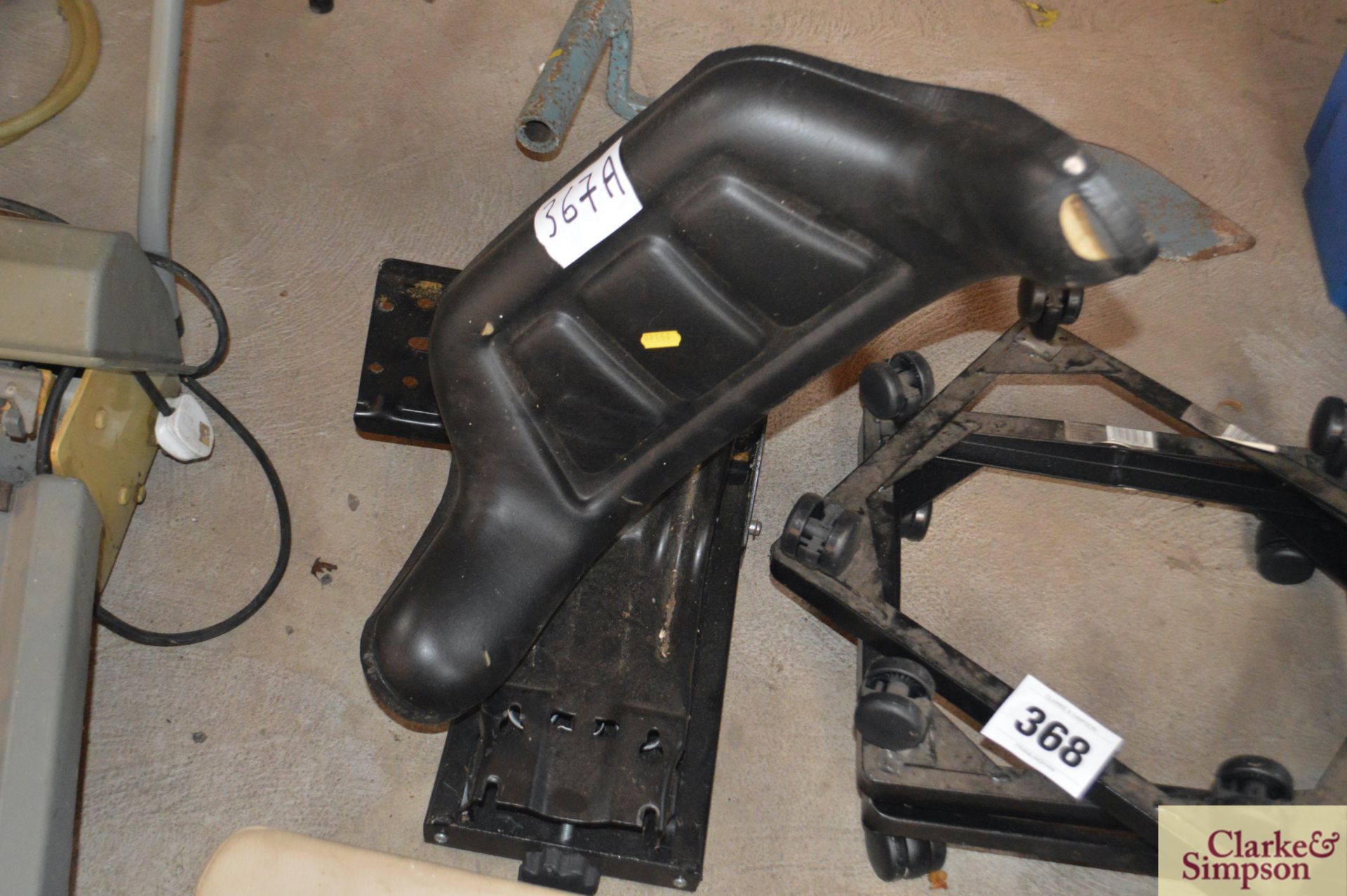 Tractor/ plant seat baseplate.